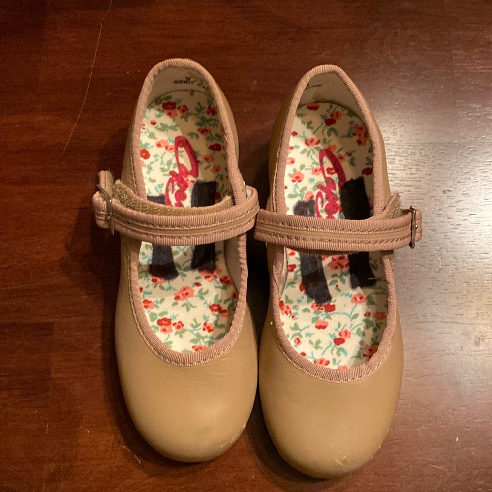Girls 9 1/2 medium tan Capezio tap shoes.